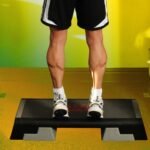Standing calf raise on an elevated surface